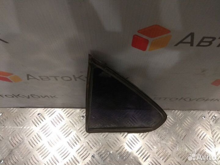 Стекло глухое двери (форточка) заднее левое