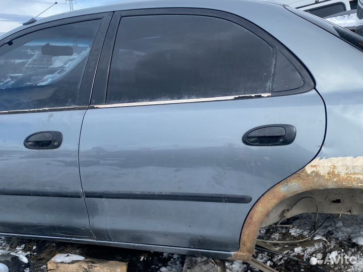 Дверь задняя левая mazda 323