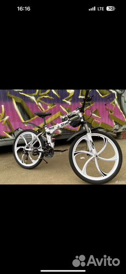 Велосипед на литых диасках складной двухподвес