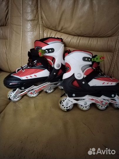 Роликовые коньки