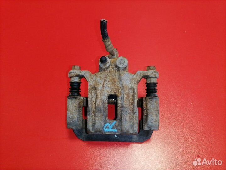 Суппорт задний правый Nissan Pathfinder R51 VQ40DE