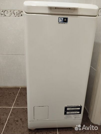 Стиральная машина с вертикальной загрузкой