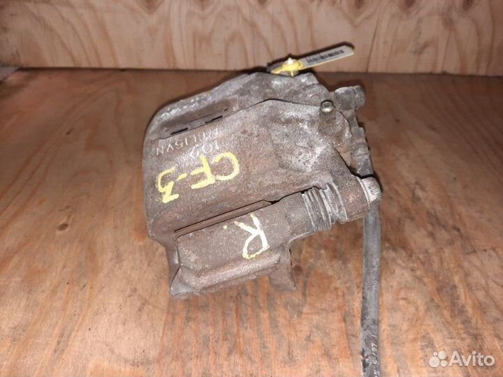 Суппорт передний левый Honda Torneo CF4 F20B 1998