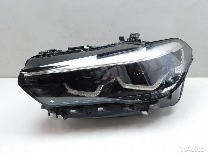 Фара левая BMW X5