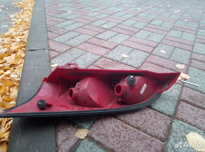 Фонарь левый хечбэк Фокус 1 1998-2004