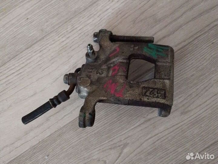 Суппорт задний левый