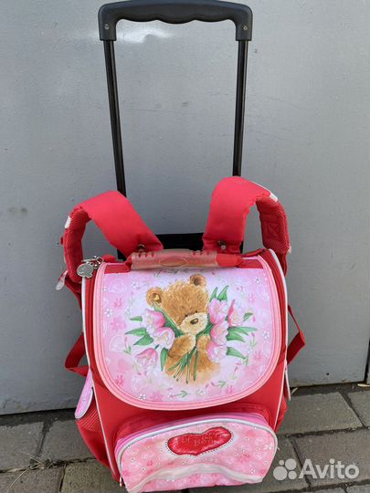 Рюкзак на колесиках,с большой выдвигающейся ручко