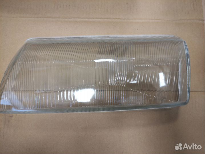 Стекло фары левое Opel Vectra 93-96