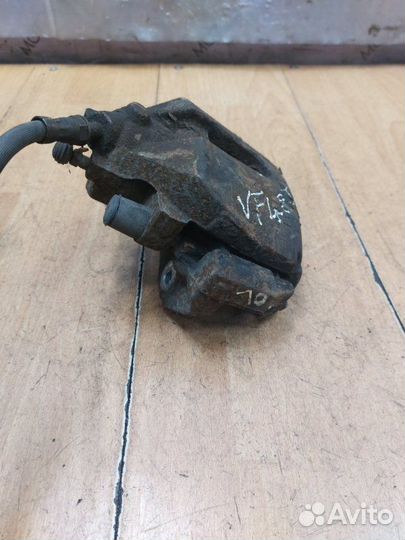 Тормозной суппорт передний правый Ford Focus 2