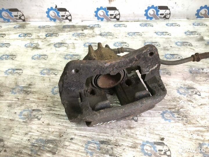 Суппорт передний левый Citroen Berlingo KFW 10FST5