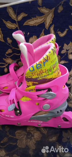 Роликовые коньки