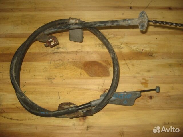 Трос ручника левый nissan Sunny '98-'04/ Bluebird