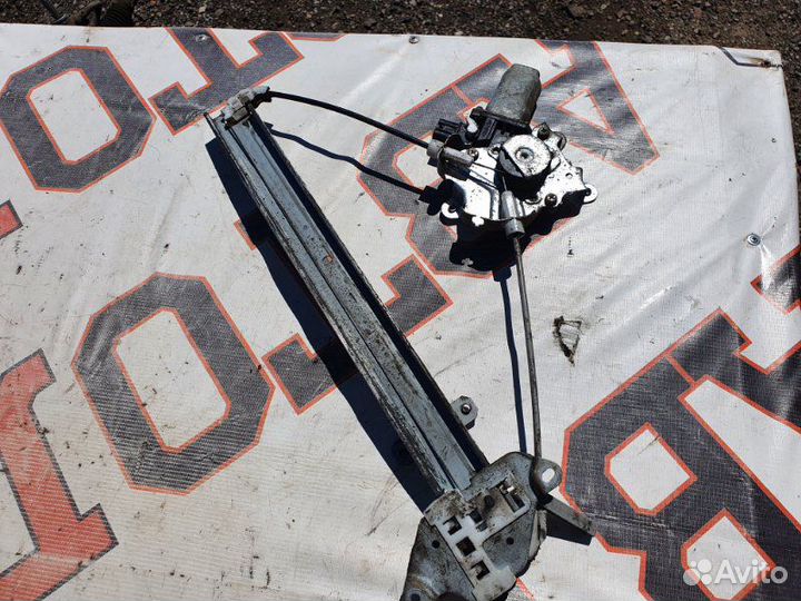 Стеклоподъемник задний левый Mitsubishi Lancer