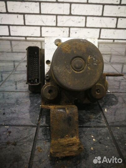 Блок абс (Насос) Ssangyong Actyon New D20DTF 2011