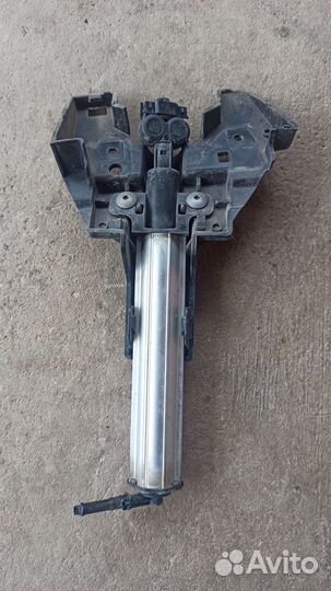 Форсунка омывателя фар левая Пежо 308