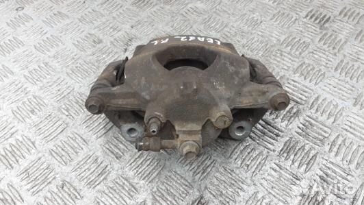 Суппорт тормозной передний правый opel astra J (LE