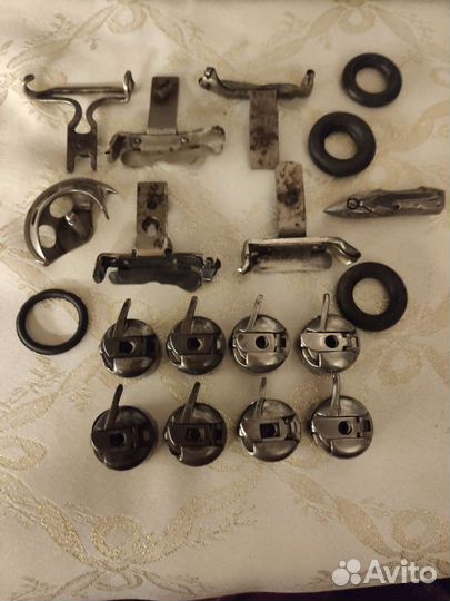 Иглы, лапки, шпульки, колпачки