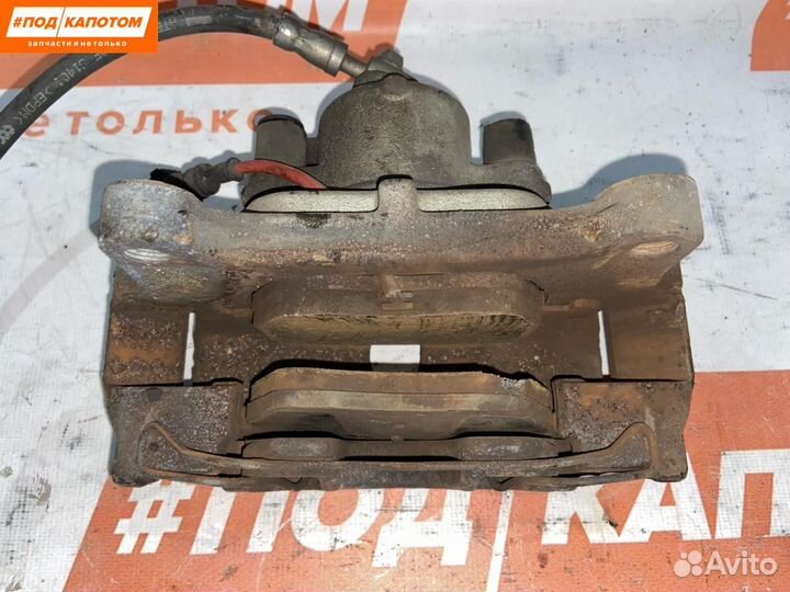 Суппорт тормозной передний левый Volkswagen Eos