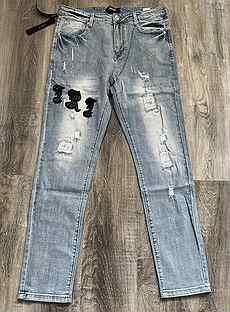 Рваные джинсы amiri