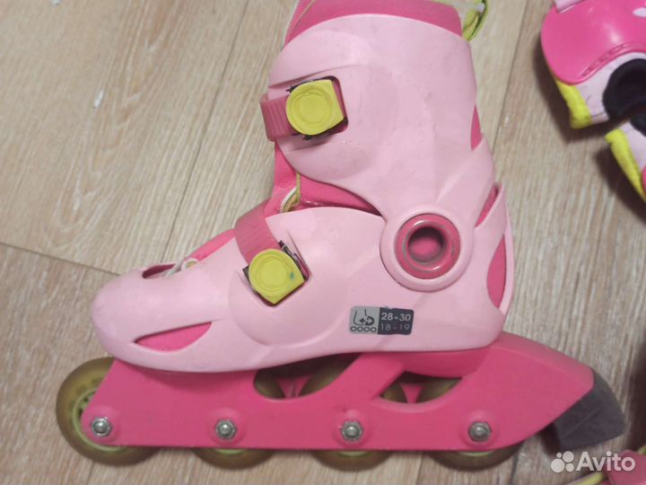 Роликовые коньки