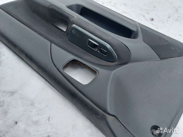 Обшивка двери передней правой Mitsubishi Lancer 9