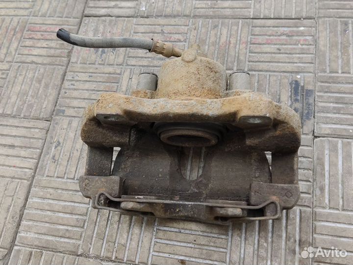 Суппорт передний левый Opel Astra H