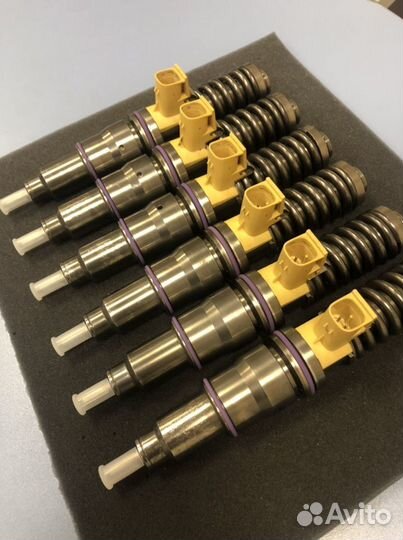 Насос форсунки Volvo D13 21340611