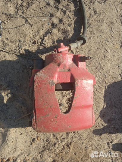 Суппорт тормозной передний левый Seat Leon