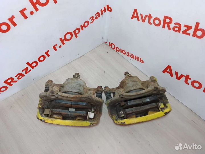 Суппорт передний Nissan Sunny N16