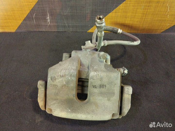 Суппорт передний левый Volkswagen Passat Variant