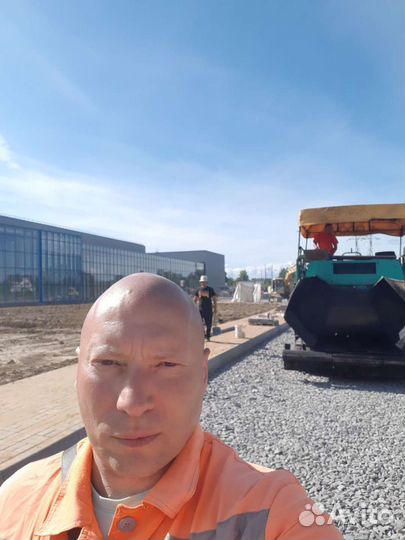 Оператор асфальтоукладчика
