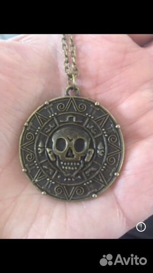 Монета Пираты карибского моря