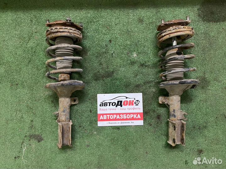 Стойка амортизатора передняя Kia Spectra 1.6