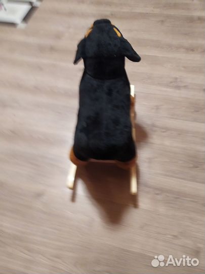 Собака качалка