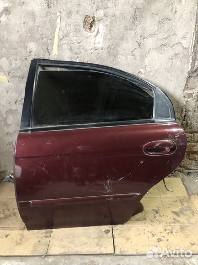 Задняя левая дверь Kia Spectra