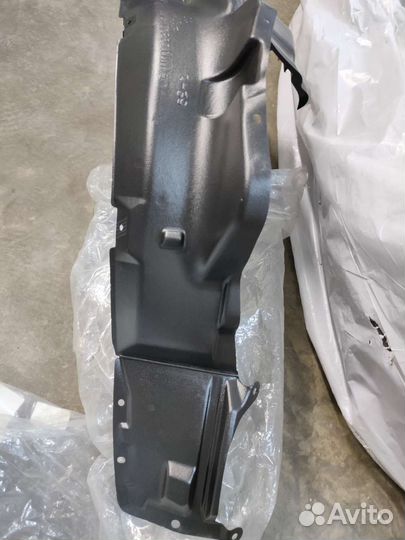 Подкрылок передний левый Lancer 9 новый оригинал