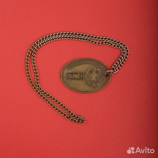 Номерной жетон полиции Германии