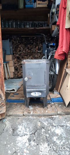 Титан (колонка водогрейная на дровах)