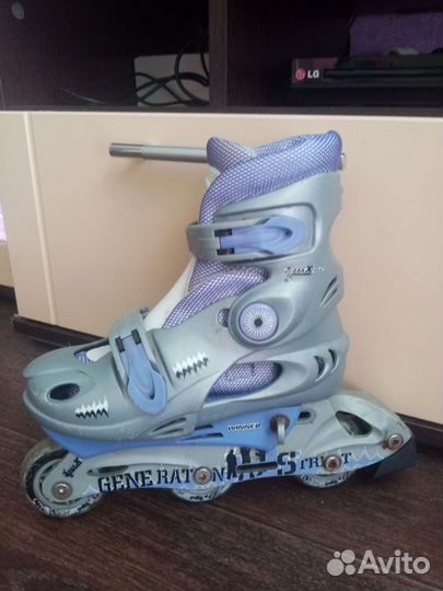 Роликовые коньки