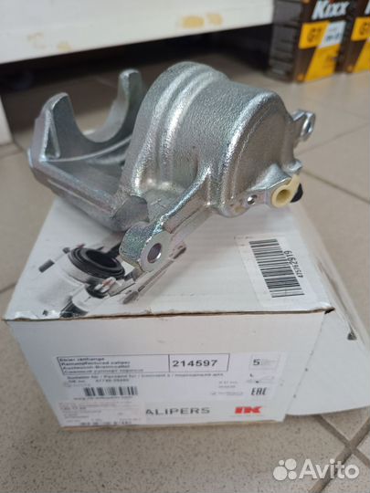 Суппорт тормозной передний левый toyota