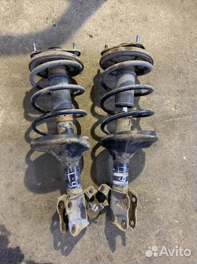 Стойки передние Митцубиси Лансер 9