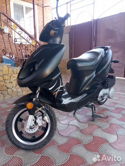 Скутер омакс