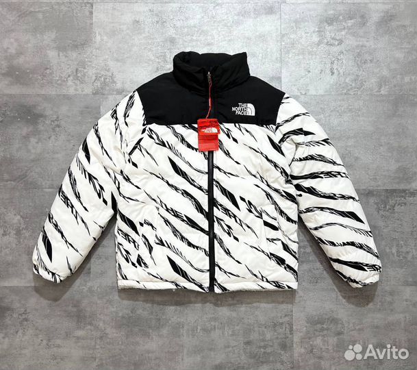 Двусторонние куртки The North Face