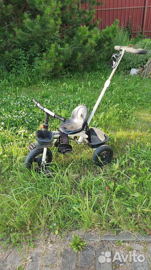 Трехколесный велосипед с ручкой