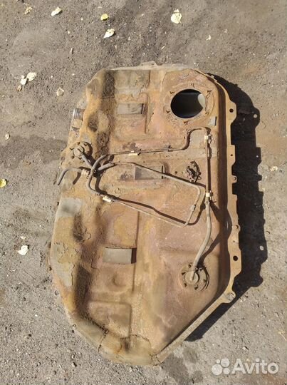 Топливный бак Митцубиси Лансер 9 клеили