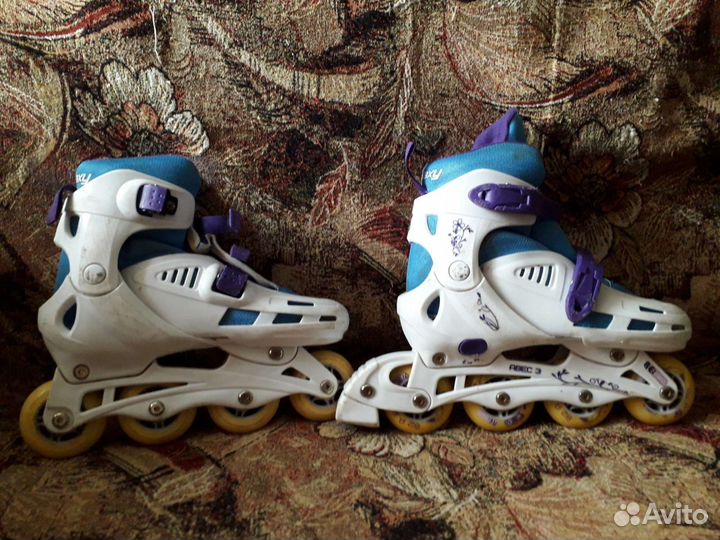 Роликовые коньки