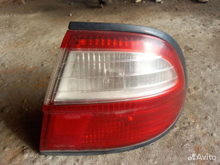 Фонарь задний правый внешний Almera m15