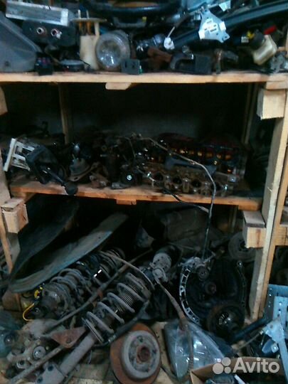 Суппорт задний левый Шевролет Лачетти