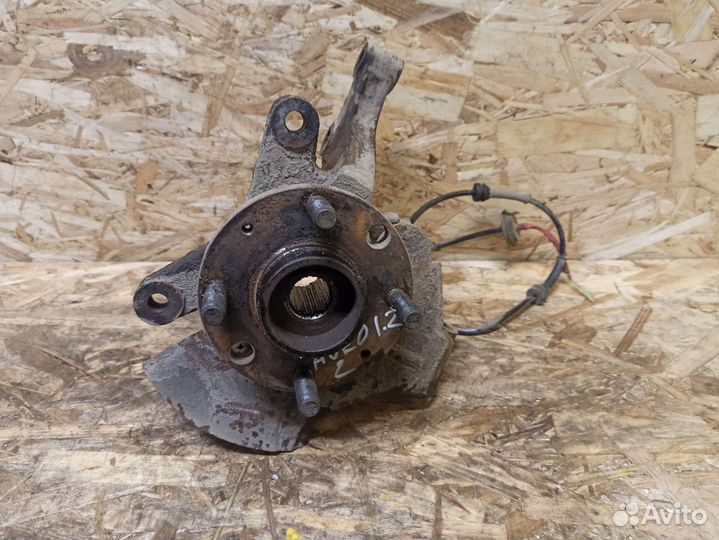 Кулак поворотный левый Chevrolet Aveo T250