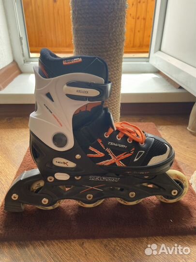 Роликовые коньки